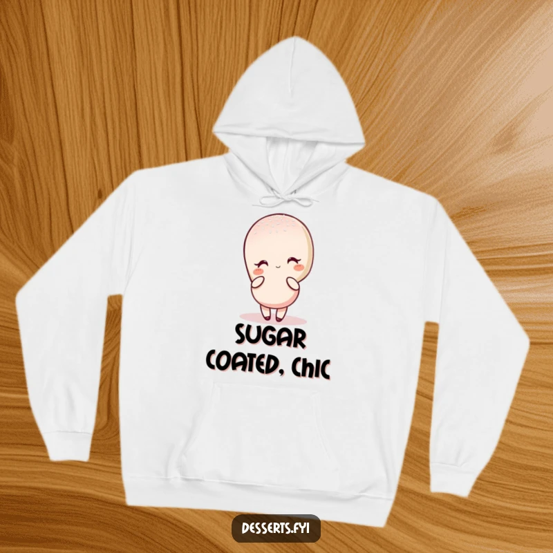 Funny hoodie featuring a charming macaron character in an elegant sugar-dusted pose, blending comfort with chic, sweet humor.